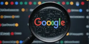 Google logo with magnifying glass and algorithm symbols